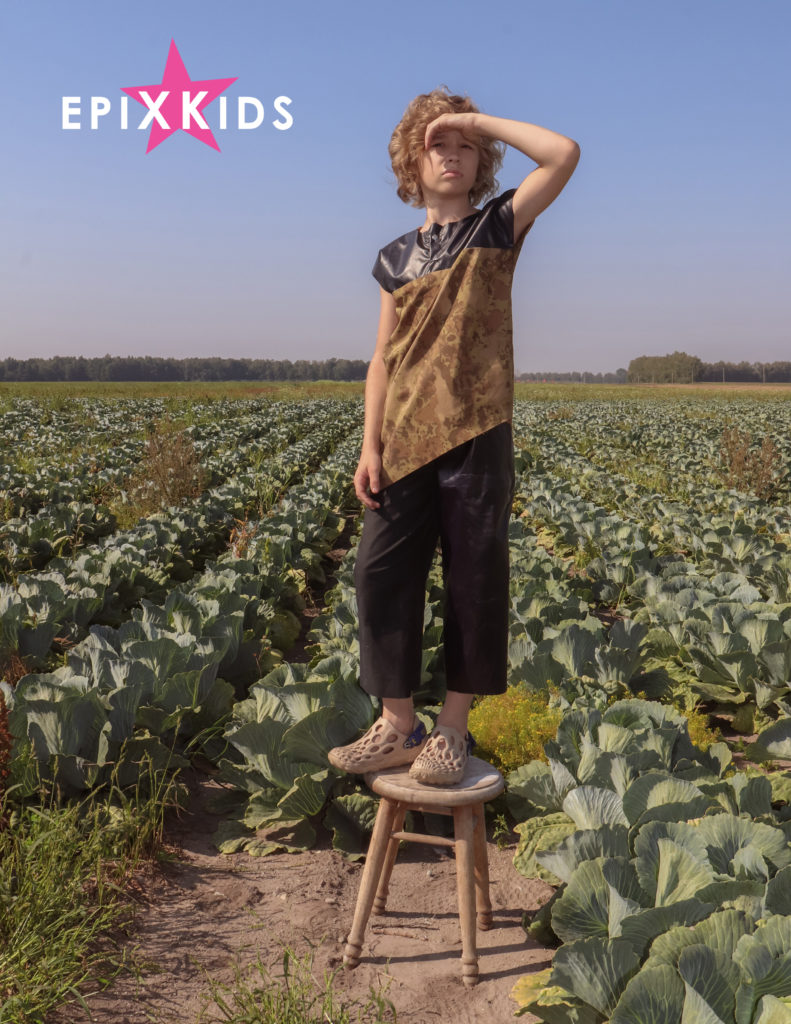 Boy in cabbage field