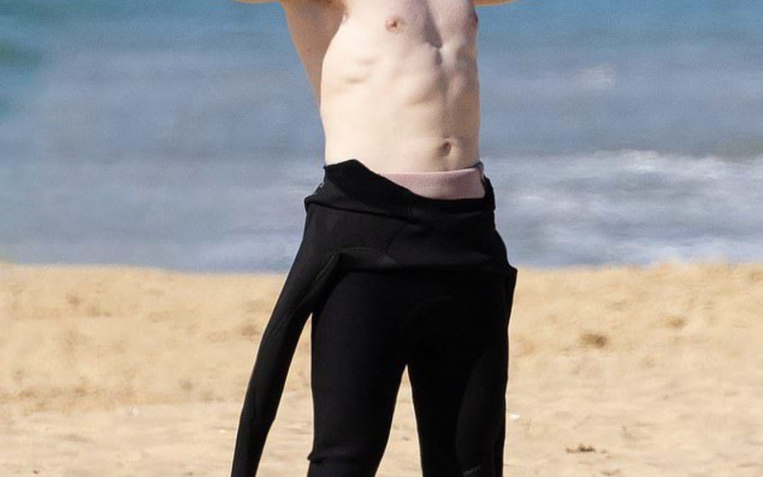 Robert Irwin, 19, thrilled his female fans by posting a picture of himself surfing in a wetsuit